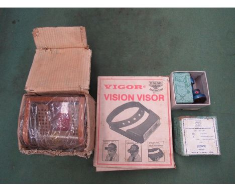 Two boxed Pearl Watch staking tools with punches and a boxed Vigor Vision Visor