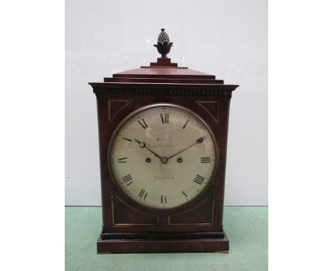 A Regency mahogany cased bracket clock with brass acorn finial, inlay, ring carry handles, side frets and feet, Roman convex 