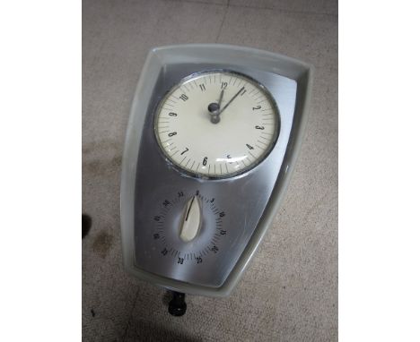 A Smith's 1950's timer wall clock in plastic body
