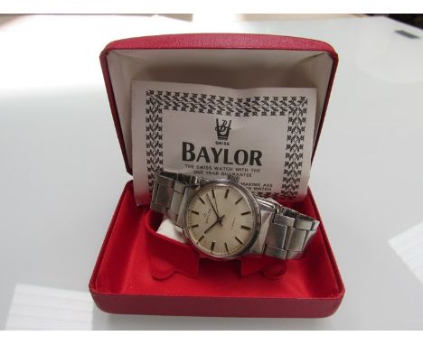 A mid 1970's Baylor 17 jewel Swiss watch on bracelet strap in case with original guarantee 