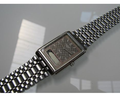 A Longines Timer and Chrono Alarm quartz bracelet watch with paperwork and spare links