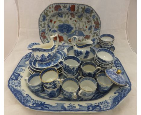 An early 19th Century Mason's Ironstone "Willow" pattern blue and white elongated platter, a smaller Mason's Patent Ironstone