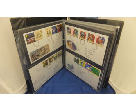 A collection of albums containing postage stamps to include UK and overseas, various first day covers, various stamped envelo