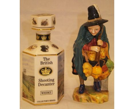 A miniature Royal Doulton figurine "Mask Seller", model No. HN 4934 (boxed), together with a Pointers of London miniature pre