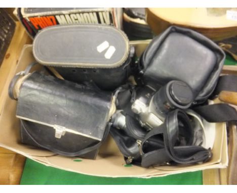 A pair of Prinz 10 x 50 binoculars in case, together with a pair of Falcon Zoom MK II 7-21 x 40 wide range angle binoculars i