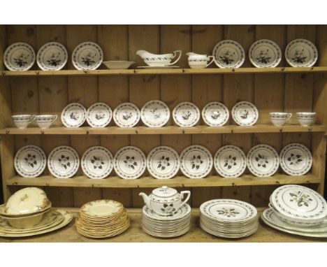 A large collection of Royal Worcester "Bernina" pattern table wares to include lidded tureen, cups and saucers, oval platters