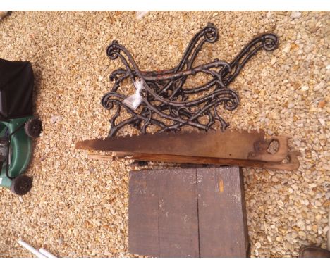 A painted iron bench frame of stylised twig form, together with a tool box containing assorted hand tools and three hand saws