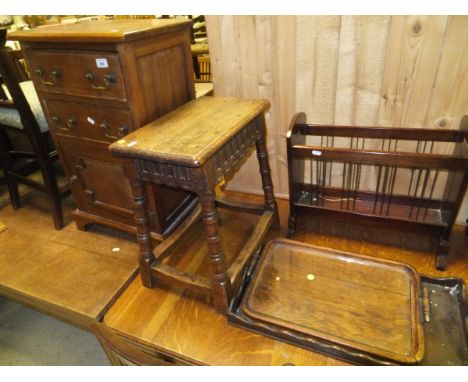 An oak coffin stool in the 17th Century style, a mahogany butler's tray, oak two-handled tray, teak bedside chest, three mode