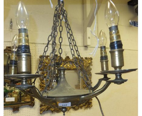 A five branch brass chandelier and a hanging oil lamp (no shade)