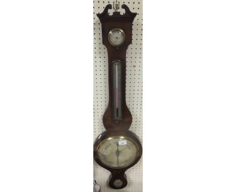 A 19th Century mahogany cased banjo barometer with swan neck pediment, humidity, split level and temperature gauge, rounded a