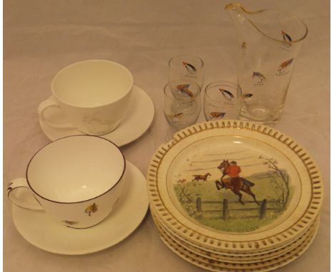 A Queensbury cup and saucer decorated with fishing flies and a small collection of glassware decorated with fishing flies, a 