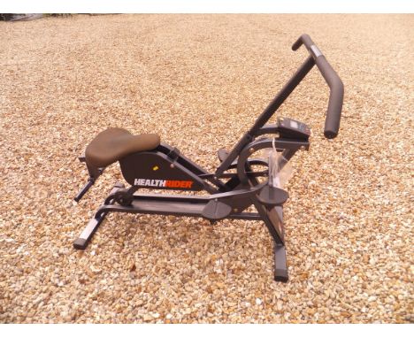 A Health Rider exercise machine, together with a Workmate bench and a lopper