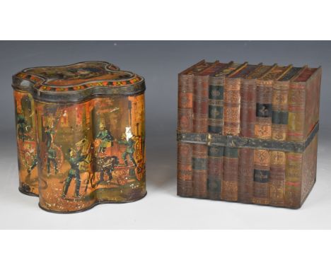Huntley and Palmer biscuit tins in the form of a set of bound books and a quatrefoil shaped tin decorated with fire brigade /