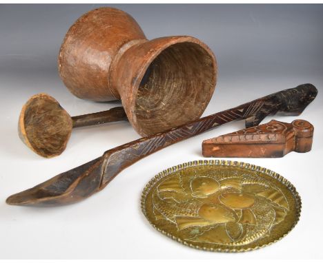 19th / 20thC African tribal items including a carved headrest / pillow or stand, ladle, large spoon, box and hammered brass t