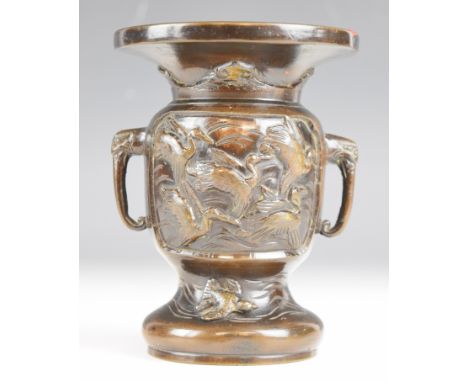 Chinese twin handled bronze vase with bird decoration, 13.6cm tall.&nbsp;