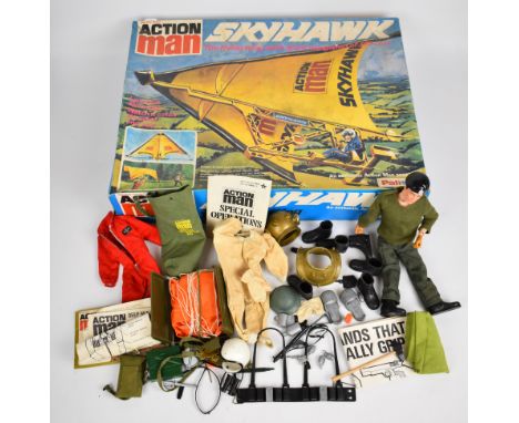 Palitoy Action Man Skyhawk glider in original box, together with one flock haired figure and a small collection of clothing a