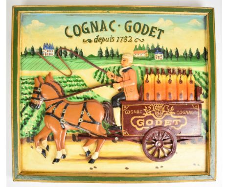 Cognac Godet depuis 1782 carved advertising plaque with decoration in relief, 39 x 46cm