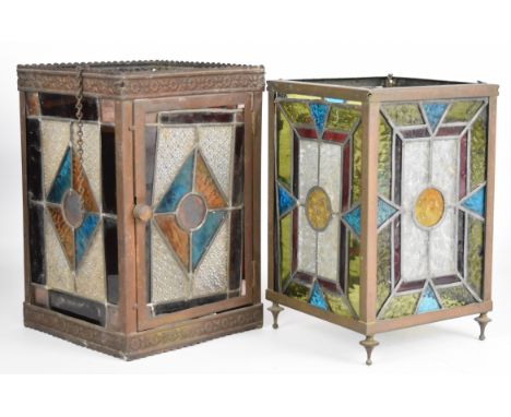 Two bronze / copper Arts and Crafts stained glass hanging light fittings, one with hinged door, largest W21 x D21 x H30cm
