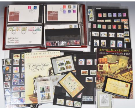 GB collection of mint stamps, four early year packs and an album of first day covers