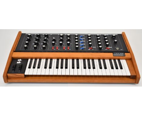 Mini Moog Voyager OS Old School Analog Synthesizer with 44 keys, serial no. OS0297, in original box with manual and patch boo