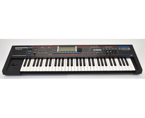 Roland Juno-G 128 Voice Expandable Synthesizer with 61 keys, serial no. ZU93099, in original box with manual. Please note the
