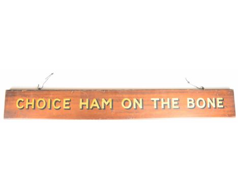 Vintage butcher's wooden advertising sign 'Choice Ham On The Bone', with gold and black lettering, 11 x 91.5cm