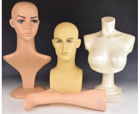 Three vintage shop display / haberdashery busts, and a lower leg display manufactured by J.A.L Plastic Display Ltd, tallest 5