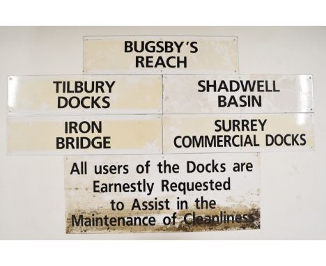 Collection of enamel signage including a large notice for St Katharine Docks stating it is free from cholera, a sign asking u