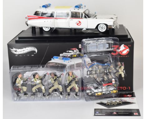 Mattel Hotwheels Elite Ghostbusters 1:18 scale diecast model Ecto-1 car with display base and figures, in original box.