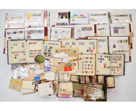 A collection of mint and used GB, Commonwealth and world stamps in albums, small tins and loose, together with GB first day c