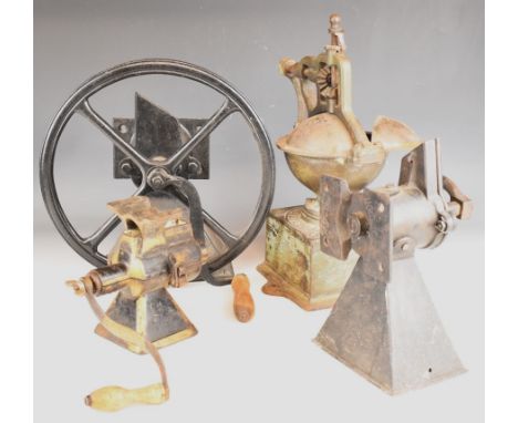 Four vintage hand cranked metal coffee grinders including Peugeot, tallest 37cm
