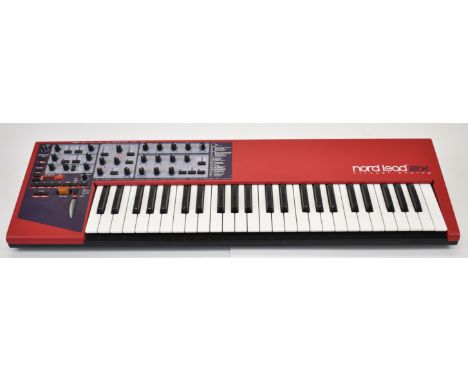 Nord Lead 2X Virtual Analog Synthesizer keyboard with 49 keys, serial no. NE14082, in original box with manual.