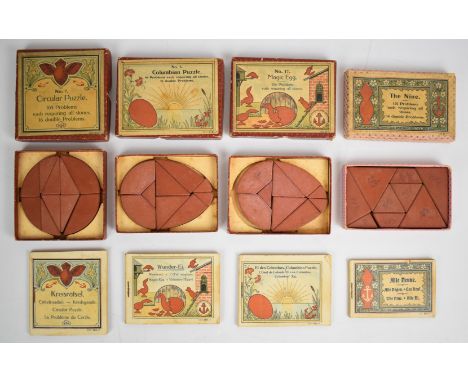 Four early 20th century stone puzzles by F. AD. Richter comprising The Nine, Magic Egg, Circular and Columbian, in original b