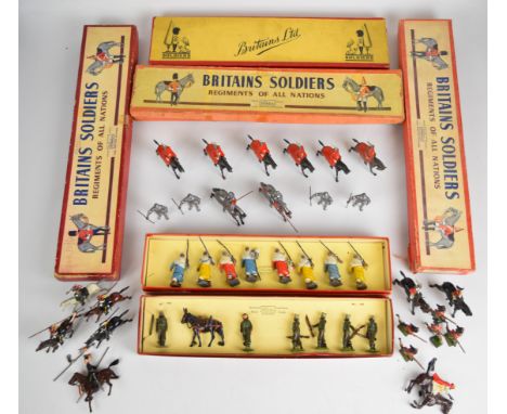 Forty Britains painted metal toy soldiers comprising Indian Army Service Corps, 12th Royal Lancers, The Life Guards, The Roya