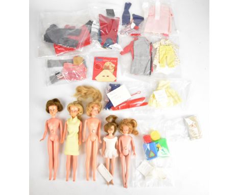 Five vintage Palitoy fashion dolls comprising three Tressy and two Toots together with a collection of clothing and accessori