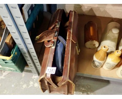 Leather briefcase containing bowls. Not available for in-house P&amp;P 