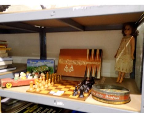 Shelf of vintage toys and games, including Petuskin backgammon, chess and table soccer. Not available for in-house P&amp;P