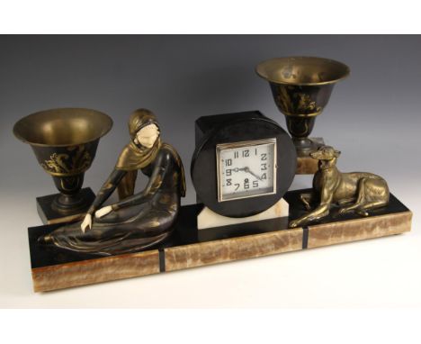 A French Art Deco slate, marble and spelter timepiece garniture, the clock with a 10cm silvered square dial applied with Arab