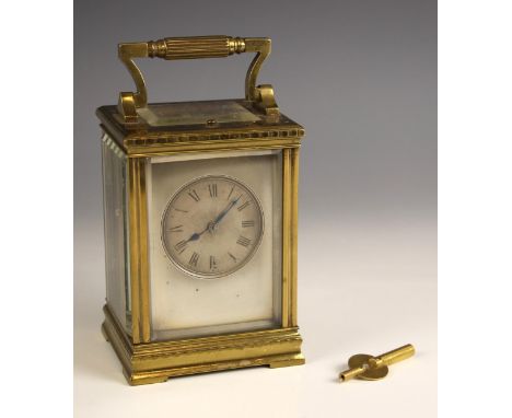 A French brass cased eight day repeating carriage clock, by Guy, Lamaille and Co, circa. 1890, the 7cm silvered dial bearing 