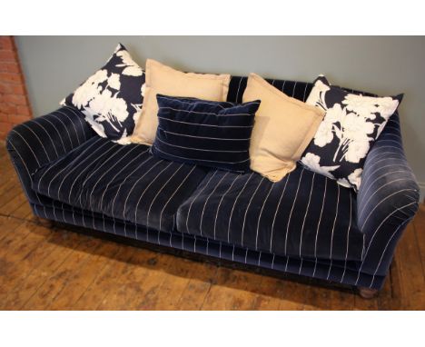 A Tetrad 'Gatsby' sofa in Ralph Lauren striped blue fabric, upon turned hardwood legs, with five assorted scatter cushions, 7