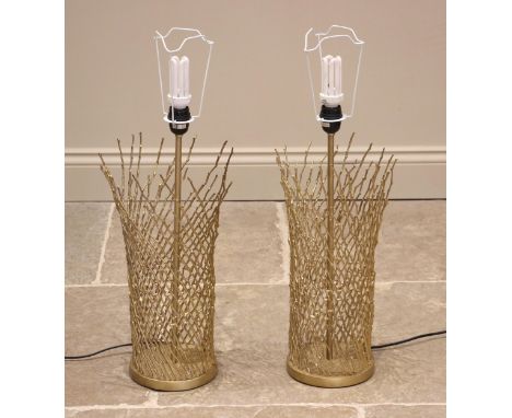 A pair of contemporary gilt metal table lamps, formed as naturalistic entwined twigs, 57cm high at fitting, complete with sha