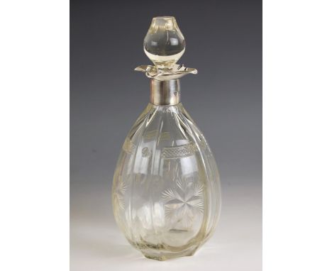 A George V silver mounted decanter, Hammond, Creake &amp; Co, Sheffield 1926, the associated stopper above quatrefoil shaped 