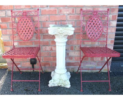 A marble effect Corinthian column pedestal sundial, 75cm high, along with a pair of painted metal lattice work patio chairs, 