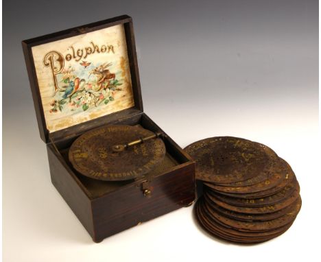 A German Polyphon, late 19th/early 20th century, the lever operated movement set to a faux rosewood case, 19cm W x 18.5cm D x