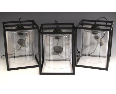 Three Norwegian Hadeland Glasswerk pendant ceiling light fittings, each with mouth blown clear glass cylinder shade supported