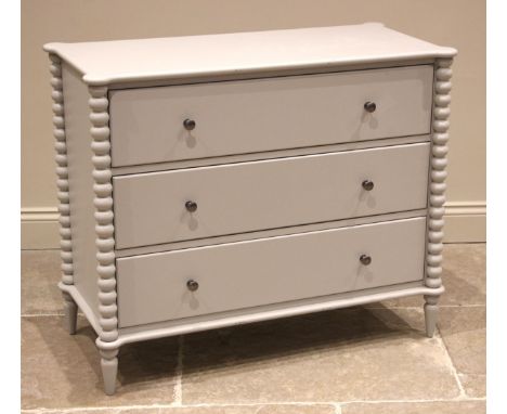 A John Lewis painted bobbin chest of drawers, early 21st century, the three long drawers housed by projected bobbin pillars e