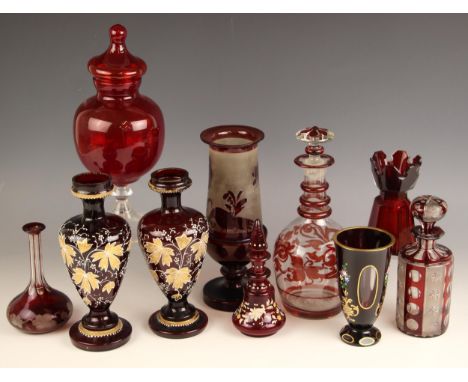 A selection of glassware, 20th century and later, to include: a red glass bonbon jar and cover, of bulbous form, raised upon 