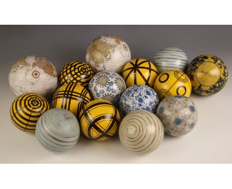 A selection of Oka decorative ceramic balls, containing a variety of designs including floral, geometric and swirl, along wit