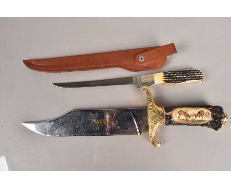 A Browning Filleting Knive, with scabbard, together with a large hunting knife, with deer scene to the grip (2)