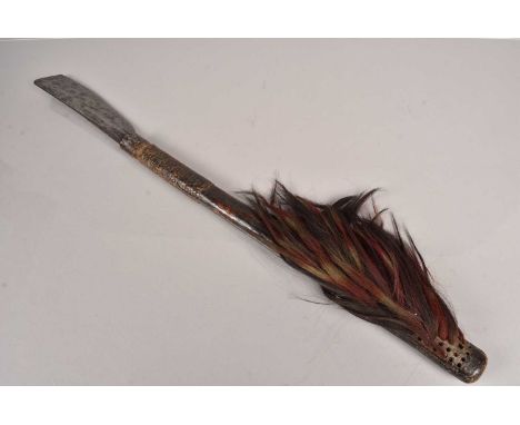 An Indian Naga Dao Chopper Axe, having applied hair decoration to the handle, 77cm